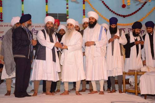 Sant Baba Amir Singh ji Mukhi Jawaddi Taksal and Sant Baba Harbhajan Singh ji releasing Gutka Sahib of Nitem and Sukhmani Sahib